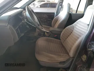 1995 Jeep Grand Cherokee Laredo with VIN 1J4GZ58S1SC704775, listed as a Copart auction lot 87556535 with 266,365 mi miles and Salvage Title. Bid and sale history available at carsss.com. Image 7.