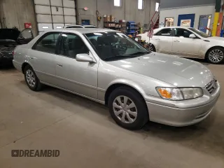 2000 Toyota Camry CE z VIN JT2BG22K1Y0483646, wystawiony jako Copart lot #53129705 z przebiegiem 187 418 mil mil oraz Szkoda całkowita • Salvage title. Historia ofert i sprzedaży dostępna na DreamBid. Obrazek 4.