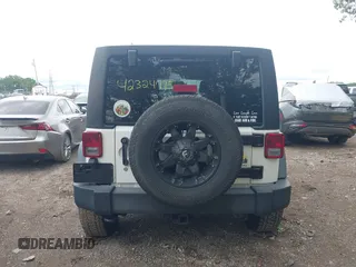 2014 Jeep Wrangler Unlimited Sport with VIN 1C4BJWDG9EL135077, listed as a IAAI auction lot 42324775 with 104,221 mi miles and . Bid and sale history available at DreamBid. Image 16.