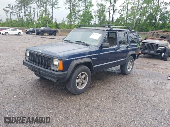 1996 Jeep Cherokee SE z VIN 1J4FJ28S5TL129065, wystawiony jako IAAI lot #42231133 z przebiegiem 225 320 mil mil oraz . Historia ofert i sprzedaży dostępna na DreamBid. Obrazek 2.