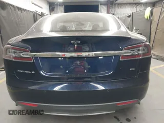 2014 Tesla Model S 60 with VIN 5YJSA1H11EFP56406, listed as a IAAI auction lot 42065157 with Not Provided miles and . Bid and sale history available at DreamBid. Image 16.