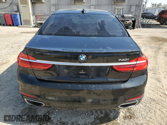 2016 BMW 7 Series 740i z VIN WBA7E2C58GG738940, wystawiony jako Copart lot #60503595 z przebiegiem 99 654 mil mil oraz Szkoda całkowita • Salvage title. Historia ofert i sprzedaży dostępna na DreamBid. Obrazek 6.