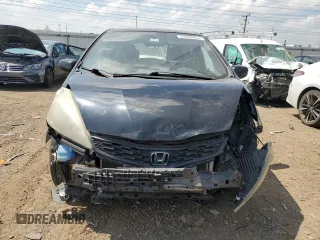 2012 Honda Fit Sport with VIN JHMGE8H55CC019255, listed as a Copart auction lot 57035445 with 193,858 mi miles and Clean Title. Bid and sale history available at DreamBid. Image 5.