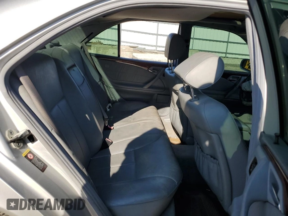 2002 Mercedes-Benz E-Class with VIN WDBJF82J42X077731, listed as a Copart auction lot 70280584 with 169,018 mi miles and Salvage Title. Bid and sale history available at carsss.com. Image 10.