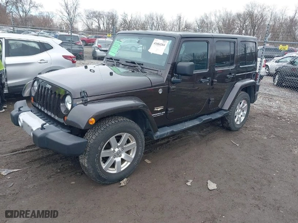 2013 Jeep Wrangler Unlimited Sahara with VIN 1C4BJWEG9DL686090, listed as a IAAI auction lot 41684264 with 126,000 mi miles. Bid and sale history available at carsss.com. Image 2.