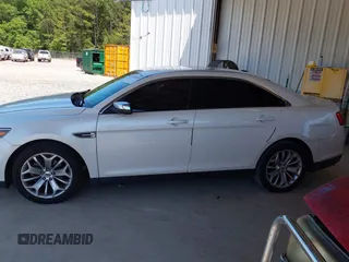 2015 Ford Taurus Limited z VIN 1FAHP2F89FG101017, wystawiony jako IAAI lot #42284459 z przebiegiem 183 167 mil mil oraz . Historia ofert i sprzedaży dostępna na DreamBid. Obrazek 14.