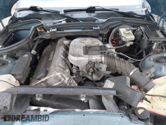 1997 BMW 3 Series 1.9L with VIN 4USCH7320VLB77355, listed as a IAAI auction lot 40758066 with 157,548 mi miles. Bid and sale history available at carsss.com. Image 10.