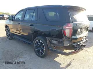 2023 Chevrolet Tahoe RST z VIN 1GNSCRKD3PR365659, wystawiony jako IAAI lot #41975472 z przebiegiem 42 264 mil mil oraz . Historia ofert i sprzedaży dostępna na DreamBid. Obrazek 3.
