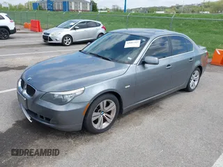 2010 BMW 5 Series 528i with VIN WBANU5C52AC129062, listed as a IAAI auction lot 42087362 with 200,403 mi miles and . Bid and sale history available at carsss.com. Image 2.