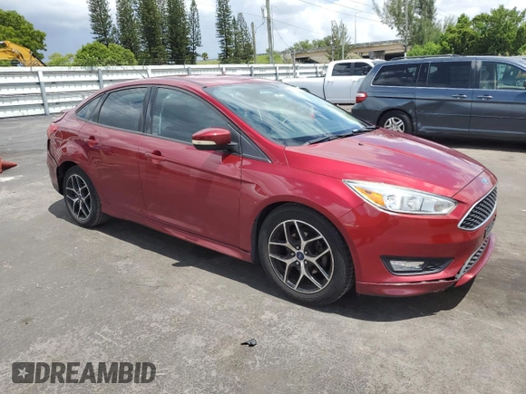 2015 Ford Focus SE z VIN 1FADP3F24FL332883, wystawiony jako Copart lot #64429655 z przebiegiem 65 939 mil mil oraz Szkoda całkowita • Salvage title. Historia ofert i sprzedaży dostępna na DreamBid. Obrazek 4.