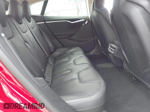 2015 Tesla Model S 85D with VIN 5YJSA1H42FF086599, listed as a IAAI auction lot 41832223 with 67,671 mi miles. Bid and sale history available at carsss.com. Image 8.