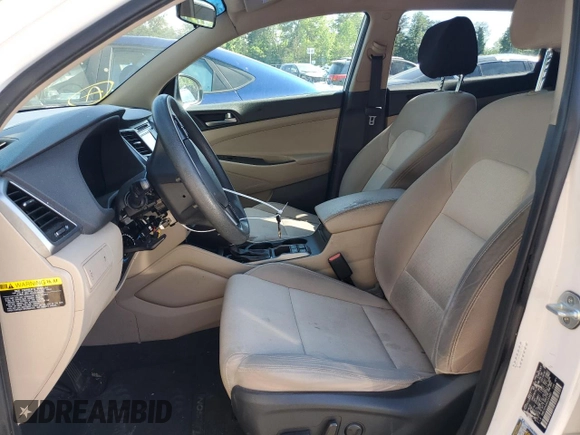 2016 Hyundai Tucson SE z VIN KM8J3CA49GU243481, wystawiony jako Copart lot #54656555 z przebiegiem 124 872 mil mil oraz Szkoda całkowita • Salvage title. Historia ofert i sprzedaży dostępna na DreamBid. Obrazek 7.