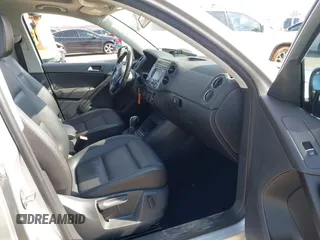 2013 Volkswagen Tiguan SE with VIN WVGAV7AX4DW545658, listed as a IAAI auction lot 41523168 with 188,729 mi miles and . Bid and sale history available at DreamBid. Image 5.