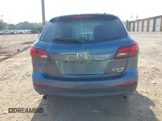 2014 Mazda CX-9 Touring with VIN JM3TB3CV7E0435659, listed as a IAAI auction lot 42428247 with 124,523 mi miles and . Bid and sale history available at DreamBid. Image 16.