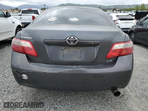 2007 Toyota Camry CE with VIN 4T1BE46K57U556135, listed as a Copart auction lot 54595615 with 248,096 mi miles and Salvage Title. Bid and sale history available at carsss.com. Image 6.