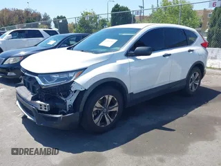 2019 Honda CR-V LX with VIN 2HKRW5H33KH407463, listed as a IAAI auction lot 42034584 with 85,454 mi miles and . Bid and sale history available at DreamBid. Image 19.