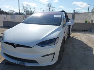 2023 Tesla Model X Plaid with VIN 7SAXCBE63PF405105, listed as a IAAI auction lot 41876918 with 22,475 mi miles and . Bid and sale history available at DreamBid. Image 18.