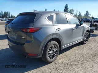 2021 Mazda CX-5 Touring with VIN JM3KFBCM7M1370676, listed as a IAAI auction lot 41975127 with 41,574 mi miles. Bid and sale history available at carsss.com. Image 4.