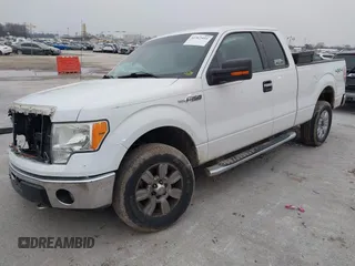 2012 Ford F-150 XL with VIN 1FTFX1EF2CFC77744, listed as a IAAI auction lot 41565431 with 200,701 mi miles. Bid and sale history available at carsss.com. Image 2.