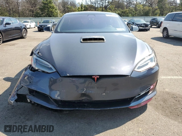2019 Tesla Model S 100D с VIN 5YJSA1E42KF312803, выставлен на аукционе Copart как лот 71246484 с пробегом 89 820 миль миль и На запчасти • Non repairable. История ставок и продаж доступна на DreamBid. Изображение 5.