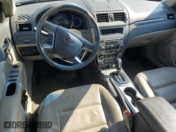 2012 Ford Fusion SEL with VIN 3FAHP0JA7CR387288, listed as a Copart auction lot 56968885 with 169,802 mi miles and Salvage title. Bid and sale history available at DreamBid. Image 8.