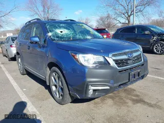 2018 Subaru Forester Touring with VIN JF2SJAWCXJH467976, listed as a IAAI auction lot 41744472 with 98,919 mi miles. Bid and sale history available at carsss.com. Image 1.