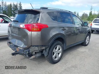 2013 Toyota RAV4 XLE with VIN JTMRFREV9DD024522, listed as a IAAI auction lot 42169755 with 164,493 mi miles and . Bid and sale history available at carsss.com. Image 4.