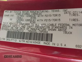 2014 Toyota Tacoma with VIN 5TFNX4CN7EX042373, listed as a IAAI auction lot 41675856 with 125,415 mi miles and . Bid and sale history available at DreamBid. Image 9.