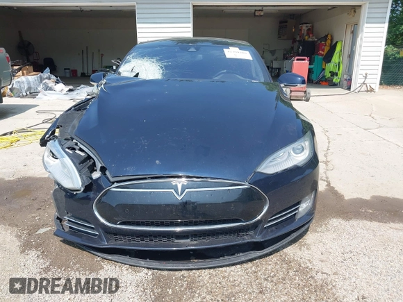 2014 Tesla Model S 60 with VIN 5YJSA1H17EFP65983, listed as a IAAI auction lot 42399288 with 166,365 mi miles and . Bid and sale history available at DreamBid. Image 13.