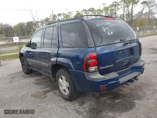 2003 Chevrolet TrailBlazer LS with VIN 1GNDS13S732260569, listed as a IAAI auction lot 41818640 with 243,938 mi miles. Bid and sale history available at carsss.com. Image 3.