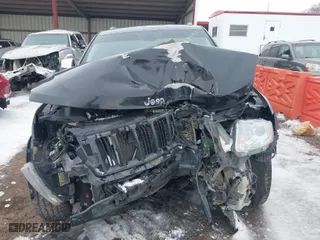 2012 Jeep Grand Cherokee Limited with VIN 1C4RJFBGXCC179054, listed as a IAAI auction lot 41729596 with 207,257 mi miles. Bid and sale history available at carsss.com. Image 6.