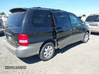 2003 Kia Sedona LX with VIN KNDUP131836369861, listed as a IAAI auction lot 42188770 with 144,280 mi miles and . Bid and sale history available at DreamBid. Image 4.
