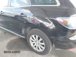 2011 Mazda CX-7 i Touring with VIN JM3ER2CM0B0402889, listed as a IAAI auction lot 42040829 with 134,836 mi miles. Bid and sale history available at carsss.com. Image 6.