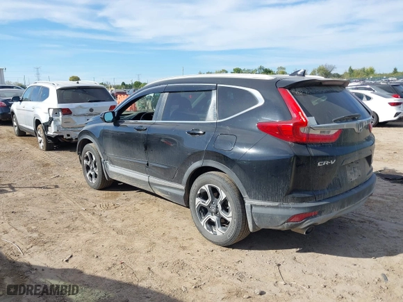 2017 Honda CR-V Touring with VIN 5J6RW2H96HL037854, listed as a IAAI auction lot 40472748 with 126,582 mi miles. Bid and sale history available at carsss.com. Image 3.