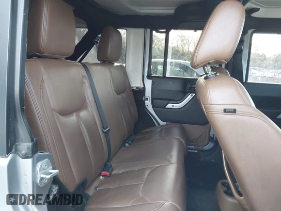 2016 Jeep Wrangler Unlimited 75th Anniversary with VIN 1C4HJWEGXGL149548, listed as a IAAI auction lot 41918007 with 254,655 mi miles. Bid and sale history available at carsss.com. Image 8.