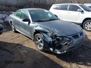 2004 Pontiac Grand Am SE1 with VIN 1G2NF52E04M653375, listed as a IAAI auction lot 41787184 with 100,062 mi miles. Bid and sale history available at carsss.com. Image 1.