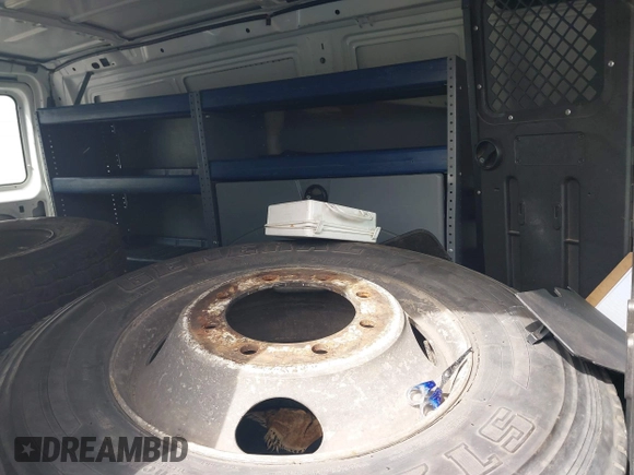 2009 Ford Econoline Cargo Commercial with VIN 1FTNE14W09DA38068, listed as a IAAI auction lot 41690071 with 182,337 mi miles and . Bid and sale history available at DreamBid. Image 8.
