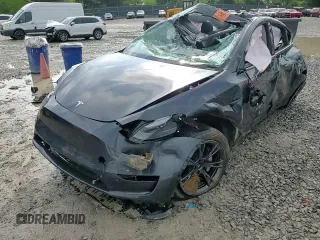 2024 Tesla Model Y Long Range z VIN 7SAYGDEEXRA324517, wystawiony jako Copart lot #55274615 z przebiegiem Nie podano mil oraz Szkoda całkowita • Salvage title. Historia ofert i sprzedaży dostępna na DreamBid. Obrazek 14.