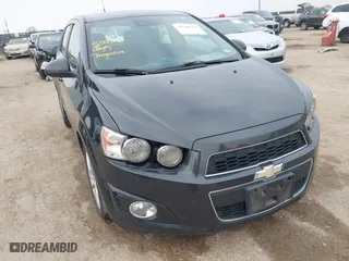 2014 Chevrolet Sonic LT with VIN 1G1JC6SH5E4153094, listed as a IAAI auction lot 41506576 with 118,833 mi miles. Bid and sale history available at carsss.com. Image 1.