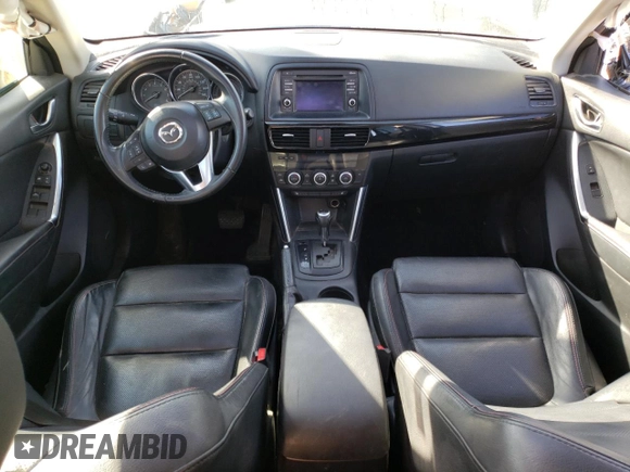 2014 Mazda CX-5 Grand Touring with VIN JM3KE4DY6E0376413, listed as a Copart auction lot 53204935 with 126,791 mi miles and Salvage Title. Bid and sale history available at DreamBid. Image 8.
