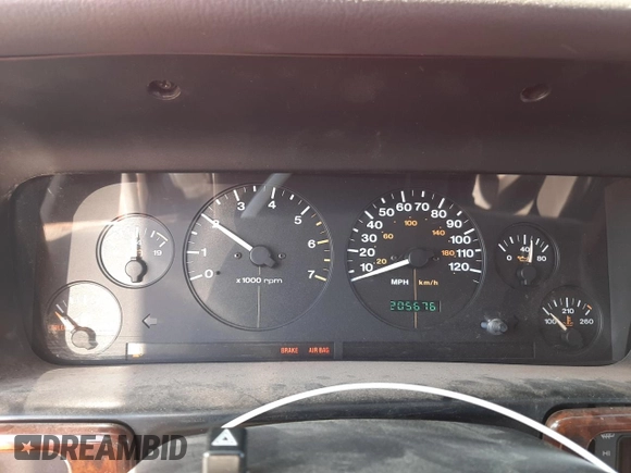 1996 Jeep Grand Cherokee Limited with VIN 1J4GZ78Y0TC376265, listed as a Copart auction lot 52124345 with 205,676 mi miles and Salvage Title. Bid and sale history available at carsss.com. Image 9.
