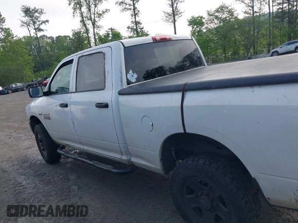 2015 Ram 2500 Tradesman with VIN 3C6TR5CT1FG628313, listed as a IAAI auction lot 42105431 with 306,368 mi miles and . Bid and sale history available at DreamBid. Image 14.