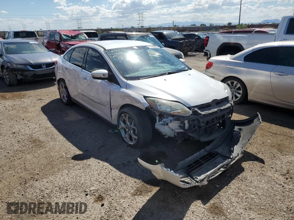 2014 Ford Focus Titanium with VIN 1FADP3J26EL132223, listed as a Copart auction lot 71490004 with 131,233 mi miles and Salvage Title. Bid and sale history available at DreamBid. Image 4.