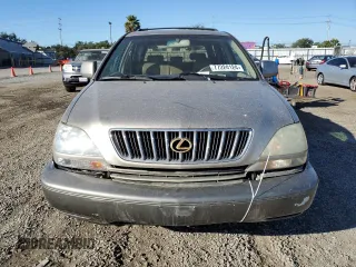 2002 Lexus RX 300 with VIN JTJGF10U120126440, listed as a Copart auction lot 77224124 with 121,395 mi miles and Salvage Title. Bid and sale history available at carsss.com. Image 5.