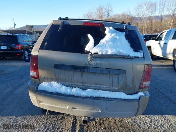 2005 Jeep Grand Cherokee Laredo with VIN 1J4HR48N55C561732, listed as a IAAI auction lot 41349373 with 185,920 mi miles. Bid and sale history available at carsss.com. Image 17.