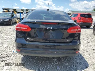 2018 Ford Focus SE z VIN 1FADP3F22JL265175, wystawiony jako Copart lot #62916255 z przebiegiem 90 348 mil mil oraz Szkoda całkowita • Salvage title. Historia ofert i sprzedaży dostępna na DreamBid. Obrazek 6.