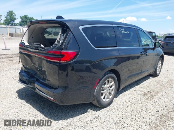 2023 Chrysler Pacifica Touring L with VIN 2C4RC1BG1PR606504, listed as a IAAI auction lot 42647652 with 41,598 mi miles and . Bid and sale history available at DreamBid. Image 4.