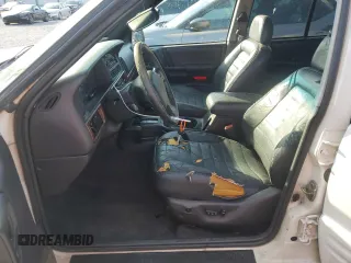 1998 Jeep Grand Cherokee Laredo with VIN 1J4GZ48Y9WC203024, listed as a Copart auction lot 83813114 with 105,044 mi miles and Non Repairable. Bid and sale history available at carsss.com. Image 7.