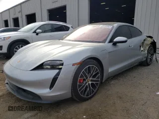 2020 Porsche Taycan 4S z VIN WP0AB2Y19LSA50933, wystawiony jako Copart lot #43690383 z przebiegiem 37 902 mil mil oraz . Historia ofert i sprzedaży dostępna na DreamBid. Obrazek 1.