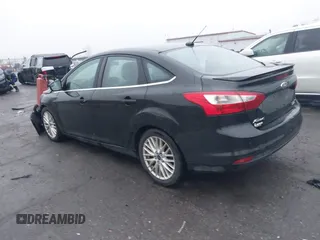 2014 Ford Focus Titanium with VIN 1FADP3J24EL439065, listed as a IAAI auction lot 40868973 with 167,739 mi miles. Bid and sale history available at carsss.com. Image 3.